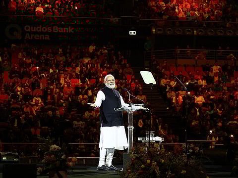 India's Prime Minister Narendra Modi speaks during an event with members of the local Indian community at the Qudos Arena in Sydney on May 23, 2023. Australia vowed to take ties with India to the "next level" on May 23 as it hosted Narendra Modi for a lavish visit heavy on trade