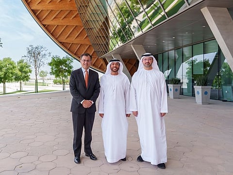 (from left) Karan Bhatia, Sultan Al Hajji and Mohamed Hussain Karmastaji standing for a photo after signed an agreement that will see the collection and analysis of data at traffic intersections in Abu Dhabi