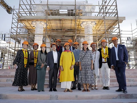 Abu Dhabi-based diplomats standing for a photograph during their visit to the construction site of the BAPS Hindu Mandir on Thursday.