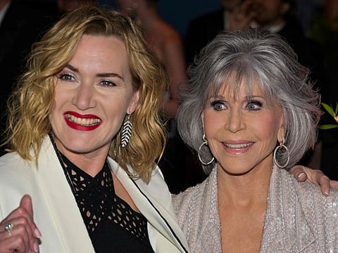 British actress Kate Winslet and US actress Jane Fonda attend the event 'Lights on Women' on the sidelines of the 76th edition of the Cannes Film Festival in Cannes, southern France, on May 26, 2023.
