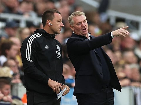 Leicester City manager Dean Smith (right) and assistant coach John Terry.