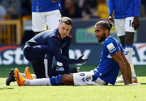Everton striker Dominic Calvert-Lewin (right) sustained an injury last weekend against Wolves and will miss their vital clash against Bournemouth on Sunday.