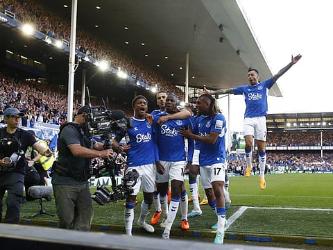 Happy ever after! Everton's Abdoulaye Doucoure celebrates scoring with Conor Coady, Demarai Gray and Alex Iwobi.