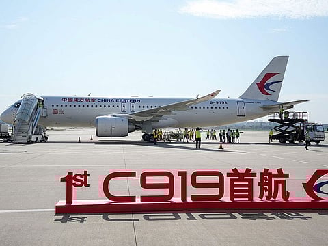 China's first domestically produced passenger jet C919 sits on the tarmac before its first commercial flight from Shanghai to Beijing, in Shanghai Hongqiao Airport on May 28, 2023.