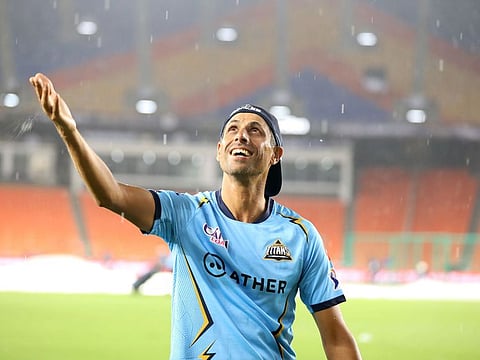Gujarat Titans’ head coach Ashish Nehra at the Narendra Modi Stadium amid heavy showers during the Indian Premier League final against Chennai Super Kings in Ahmedabad on May 28, 2023. The match was played the next day.