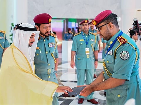 (left) Sheikh Mohammed bin Humaid Al Qasimi, Head of the Department of Statistics and Community Development, and (second left) Maj. Gen. Saif Al Zari Al Shamsi, Commander-in-Chief of Sharjah Police, during the global ‘Future Readiness Award’ ceremony on Thursday