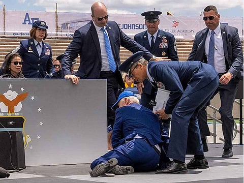 US President Joe Biden falls on stage during the 2023 United States Air Force Academy Graduation Ceremony at Falcon Stadium, on Thursday, June 1, 2023, in Colorado Springs, Colorado.