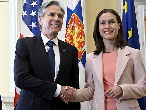 US Secretary of State Antony Blinken and Finnish Prime Minister Sanna Marin shake hands as they meet at the Prime Minister's Office at the Government Palace in Helsinki, Finland, on June 2, 2023.