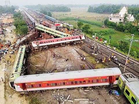 A drone view shows derailed coaches after two passenger trains collided in Balasore district in the eastern state of Odisha, on June 3, 2023.
