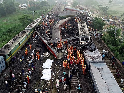 Disaster struck when a passenger train hit a stationary freight train, jumped off the tracks and hit another passenger train coming from the opposite direction.