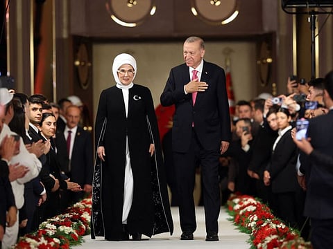 Turkish President Tayyip Erdogan and his wife his wife Emine Erdogan greet guests during his oath taking ceremony at the Presidential Complex, in Ankara, Turkey.