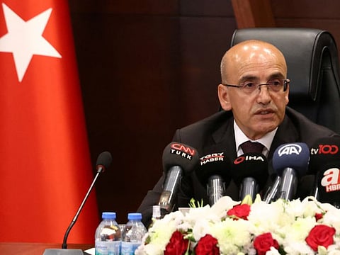Turkey's newly appointed Finance Minister Mehmet Simsek attends an handover ceremony in Ankara.