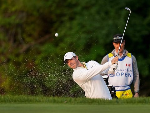 Rory McIlroy blasts out of the bunker on the 11th hole during the Canadian Open Pro-Am in Toronto on Wednesday.