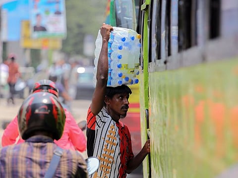 A street vendor sells bottles of chilled water during high temperatures in Dhaka, Bangladesh, on Tuesday, June 6, 2023.
