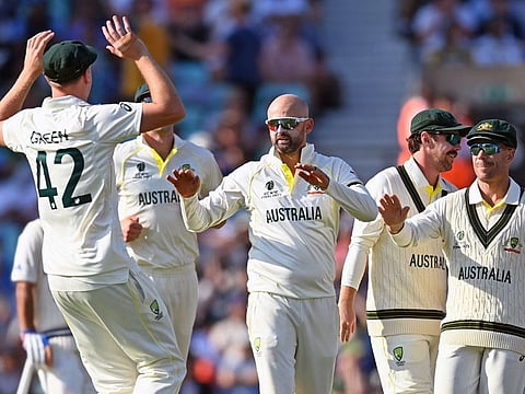 Australia's Nathan Lyon celebrates after claiming the wicket of India's Ravindra Jadeja during Day 2 of the ICC World Test Championship cricket final at The Oval, in London, on June 8, 2023. Jadeja topscored for India with a 51-ball 48.