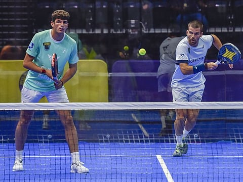 Javier Garrido Gomez and Arturo Coello of Panthers in action against Federico Chingotto and Francisco Navarro Compan of Tigers during World Padel League at Coca Cola Arena in Dubai.