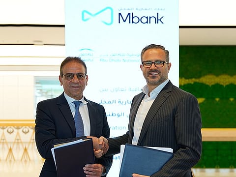 Osama Abdeen, Chief Executive Officer, Abu Dhabi National Takaful Company and Mohammed Wassim Khayata, Chief Executive Officer of Al Maryah Community Bank sign MoU