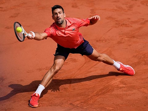 Serbia's Novak Djokovic plays a shot against Spain's Carlos Alcaraz during their semi-final match at the Roland Garros stadium in Paris on Friday.