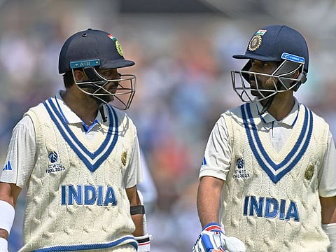 India's Shardul Thakur (left) and Ajinkya Rahane walk off the pitch for lunch on Day 3 of the ICC World Test Championship cricket final against Australia at The Oval, in London, on June 9, 2023. Their 109-run stand for the seventh wicket was the cornerstone of India’s total of 296.
