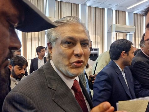 Pakistan's Finance Minister Ishaq Dar leaves after a post-budget press briefing for the 2023/24, in Islamabad.