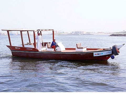 A traditional abra operated under Ajman Transport Authority.