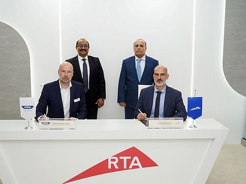 Mattar Al Tayer (standing, right), Director-General, Chairman of the Board of Executive Directors of Dubai’s Roads and Transport Authority (RTA) witnessed the signing of partnerships with specialised global bus manufacturers to improve public transportation sustainability