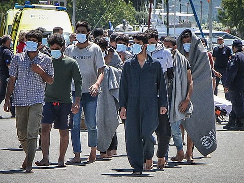 Migrants arrive at the port of Kalamata, following a rescue operation, after their boat capsized at open sea, in Kalamata, Greece, June 14, 2023.