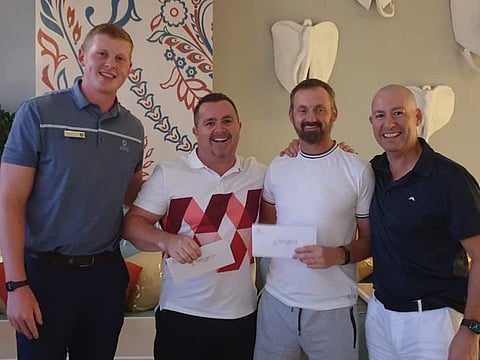 Thursday Curry Club Winning Team alongside Rory Stewart (left) Golf Services Executive