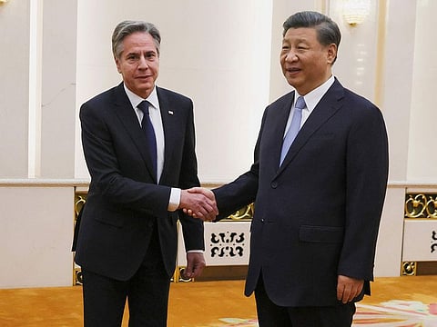 U.S. Secretary of State Antony Blinken shakes hands with Chinese President Xi Jinping in the Great Hall of the People in Beijing, China.