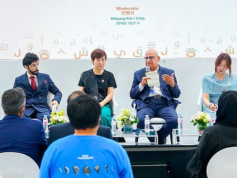 Abdul Hamid Ahmad, Editor-in-Chief of Gulf News (second from right) alongside Hazza Abu Al Rish (extreme left), author and journalist at Al Ittihad Arabic daily newspaper, and Korean author and journalist Yong-sil Jeong. The session was moderated by Korean critic Mihyang Kim.