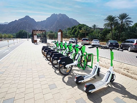 A micromobility station in Hatta, Dubai. These stations feature a variety of soft mobility means like bikes, mountain bikes, and e-scooters.