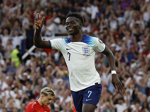 England's Bukayo Saka celebrates after scoring their fifth goal and his hat-trick against North Macedonia at Old Trafford.
