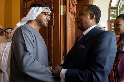 Sheikh Mohamed bin Zayed Al Nahyan, President of the United Arab Emirates (L) receives Denis Sassou Nguesso, President of Congo (R), during a Sea Palace barza.