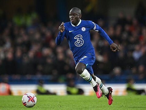 Chelsea's midfielder N'Golo Kante controls the ball during a Premier League match against Aston Villa at Stamford Bridge in April 1.