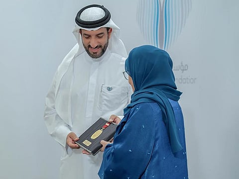 Sheikha Jawaher bint Mohammed Al Qasimi, Wife of His Highness the Ruler of Sharjah honouring Sheikh Sultan bin Ahmed bin Sultan Al Qasimi with Jawaher Medal of Honour