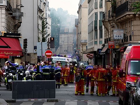 French firefighters and rescue forces work after several buildings on fire following a gas explosion in the fifth arrondissement of Paris, France, June 21, 2023.