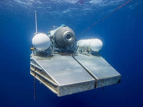 This undated image courtesy of OceanGate Expeditions, shows their Titan submersible on a platform awaiting signal to dive.