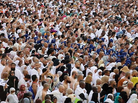 Pilgrims perform prayers at the Grand Mosque in the Saudi holy city of Mecca ahead of the Hajj pilgrimage, on June 19, 2023.