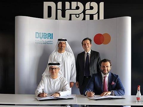 The MoU was signed by Hadi Badri, CEO of Dubai Economic Development Corporation at DET, and J.K. Khalil, Cluster General Manager, MENA East at Mastercard.