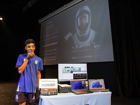 A student interact with astronaut Sultan Al Neyadi during the ham radio session held at a school in Dubai.