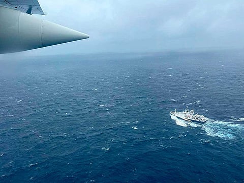 A US Coast Guard HC-130 Hercules airplane flies over the French research vessel, L'Atalante approximately 900 miles East of Cape Cod, during the search for the Titan submersible, on Thursday, June 22, 2023.