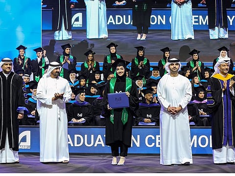 Sheikh Ahmed bin Saeed Al Maktoum (2nd L) and Sheikh Mansoor bin Mohammed bin Rashid Al Maktoum (2nd R) during the MBRU Graduation ceremony in Dubai