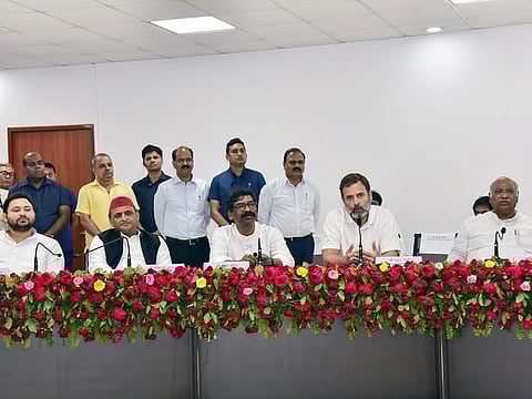 Congress leader Rahul Gandhi addresses a press briefing in the presence of Jharkhand Chief Minister Hemant Soren, Bihar Deputy CM Tejashwi Yadav, Congress President Mallikarjun Kharge and Samajwadi Party (SP) chief Akhilesh Yadav after the conclusion of the Opposition leaders' meeting, in Patna on Friday.