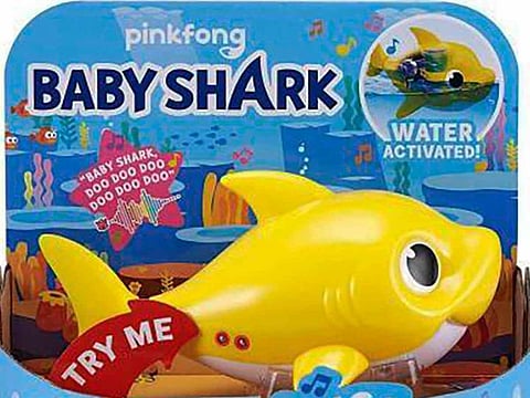 This image provided by Consumer Product Safety Commission shows Zuru’s full-sized Robo Alive Junior Baby Shark Sing & Swim Bath Toys