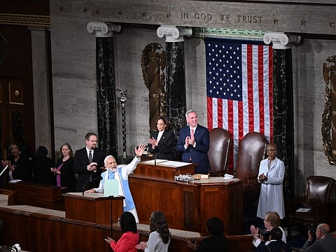 India's Prime Minister Narendra Modi waves as he addresses a joint meeting of Congress at the US Capitol in Washington, DC, on June 22, 2023.
