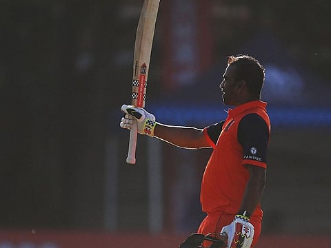 Teja Nidamanuru of Netherlands celebrates after scoring a century during the ICC Men's Cricket World Cup Qualifier against the West Indies at Takashinga Cricket Club on Monday.