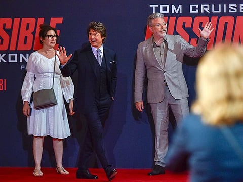 US actor Tom Cruise and director Christopher McQuarrie during the premiere of film 'Mission: Impossible Dead Reckoning Part One' in Abu Dhabi on June 26, 2023.