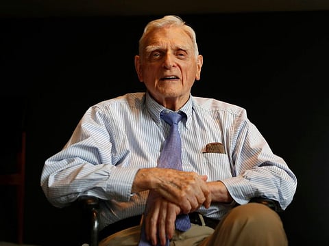 Nobel chemistry winner John B. Goodenough poses for the media at the Royal Society in London, Wednesday, Oct. 9, 2019.