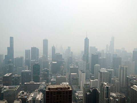 Chicago's skyline is seen from the 360 Chicago Observation Deck of the John Hancock Building with heavy smoke from the Canadian wildfires blanketing the city, on June 27, 2023, in Chicago, Illinois.