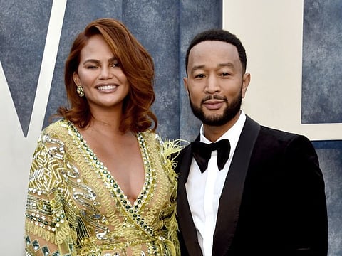 Model Chrissy Teigen with her singer-songwriter husband John Legend.